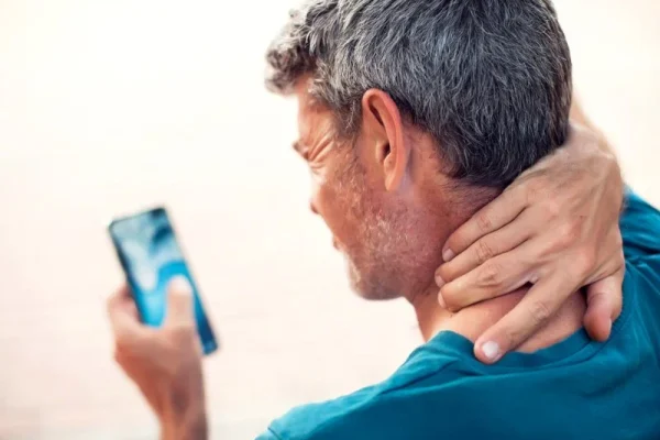 tech neck & text thumb caused by device use and poor posture