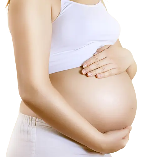 Pregnant woman holding her belly, representing prenatal care and pregnancy support